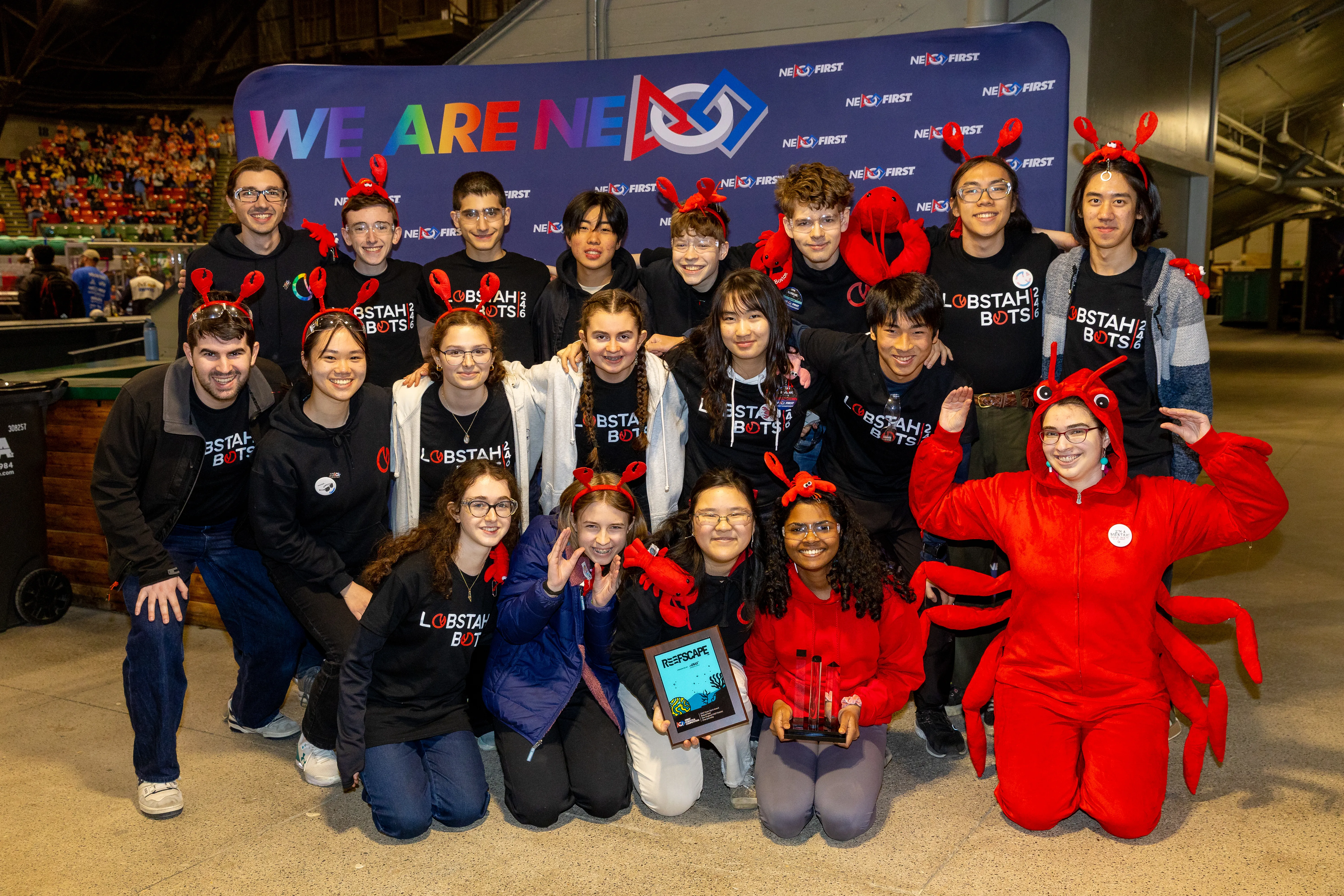 The team poses after winning the Team Spirit Award at District Championships